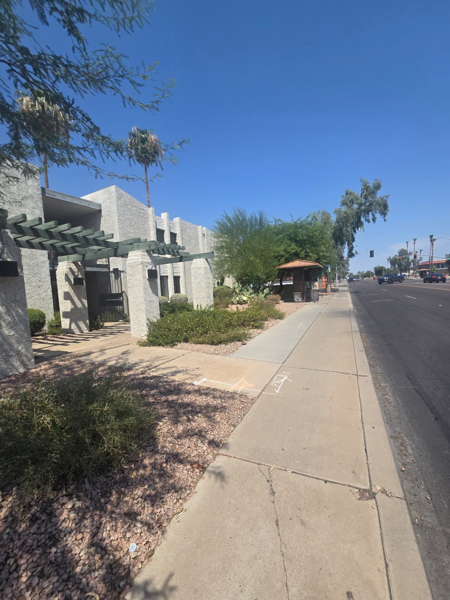 A1 Testing & Certification Center exterior with ORBIT bus stop on W Broadway Ave, Tempe